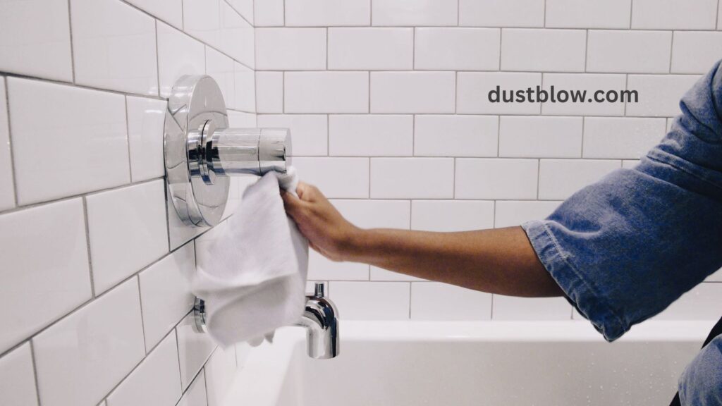How can I clean my shower and bathtub effectively?